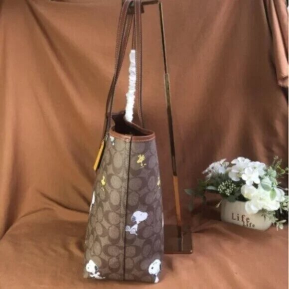 Coach X Peanuts City Tote In Signature Canvas With Snoopy Woodstock Print - Picture 4 of 11